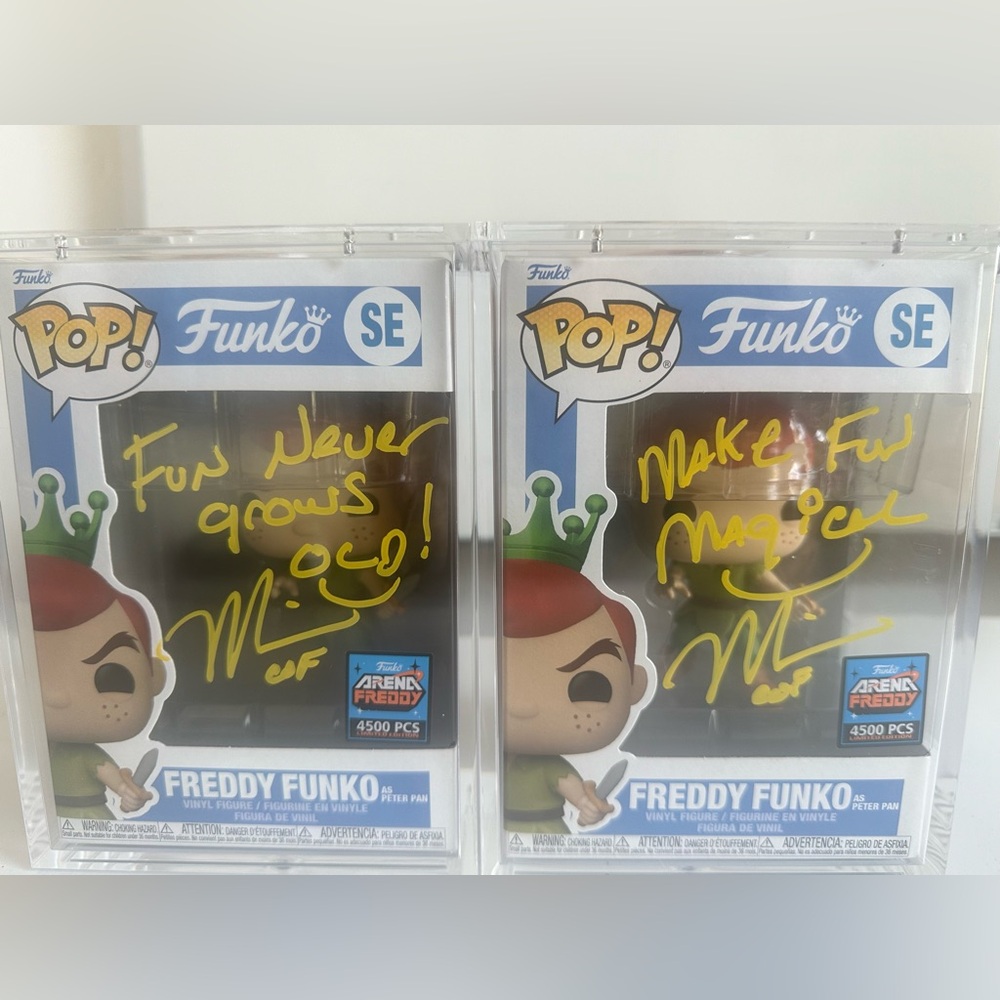 2 Freddie Funko Figures as Peter Pan in PopShield Cases Signed by Mike Becker